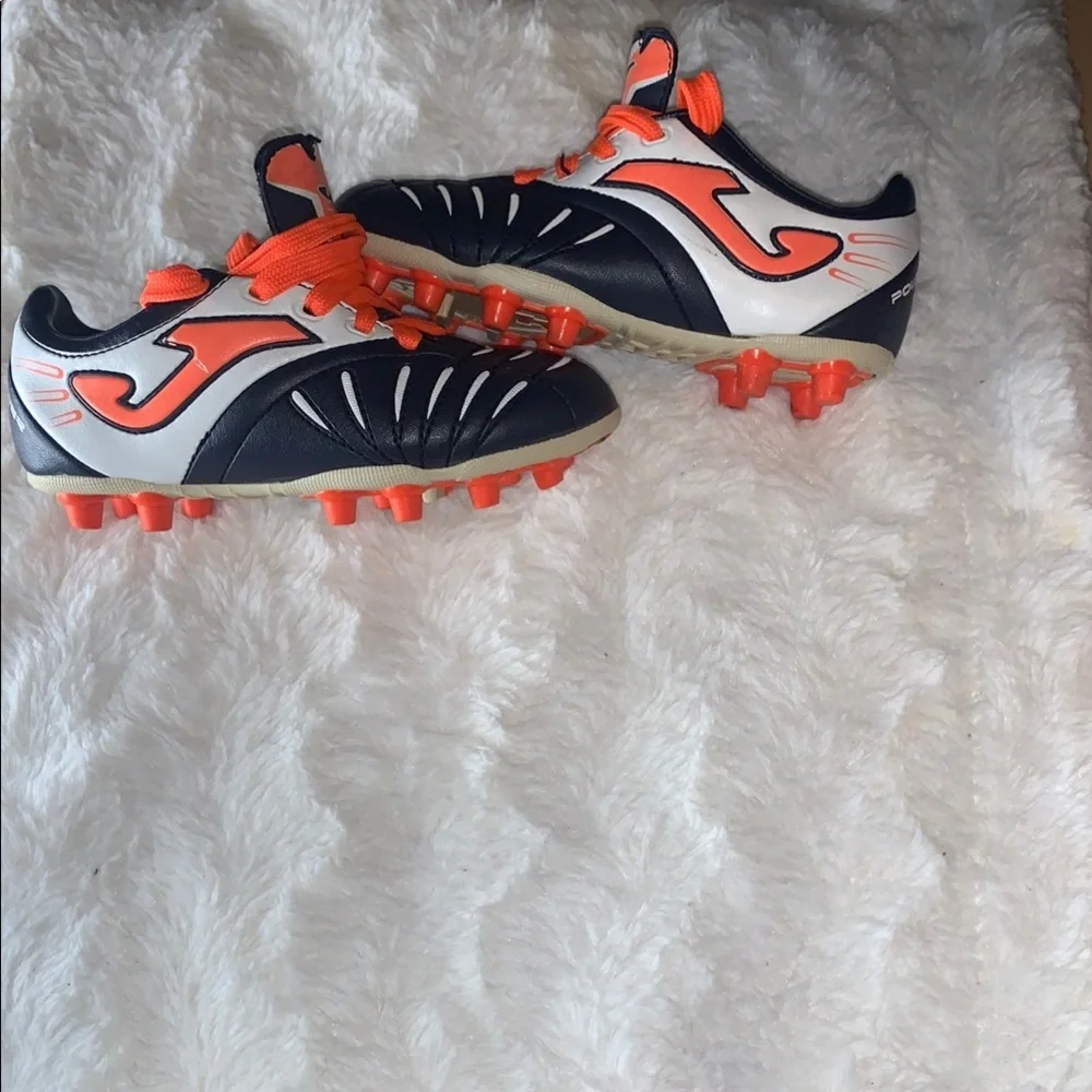 Kids Black and Orange Soccer Shoes like new